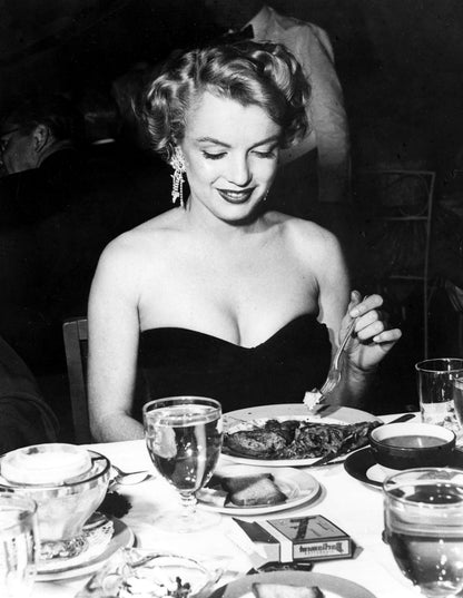 Marilyn Monroe Sitting at Table